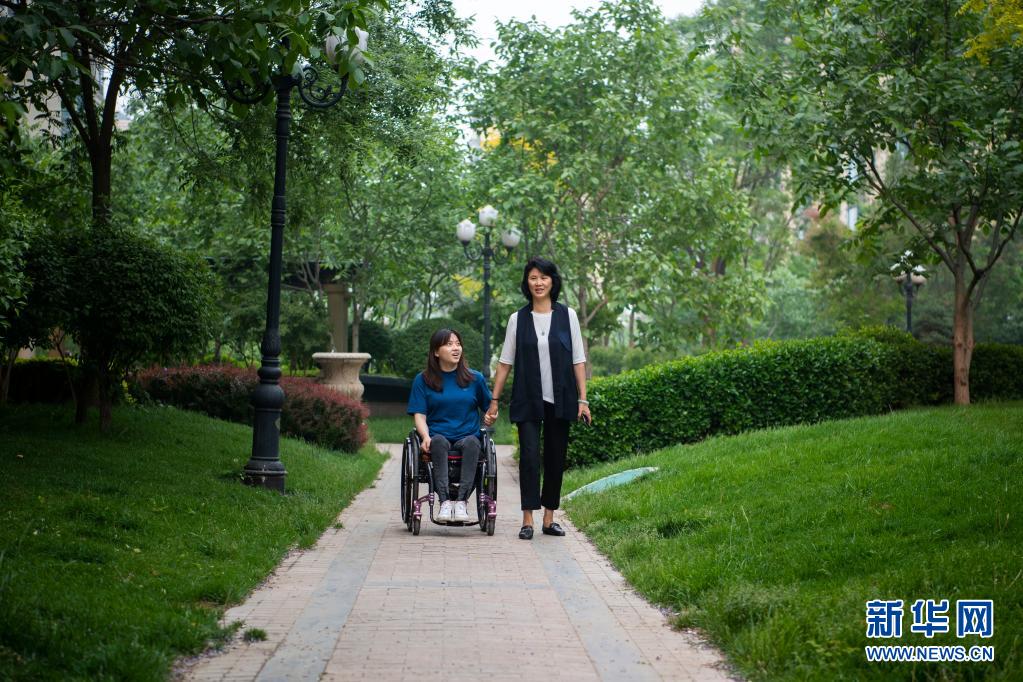 图片故事：轮椅上的追梦人
