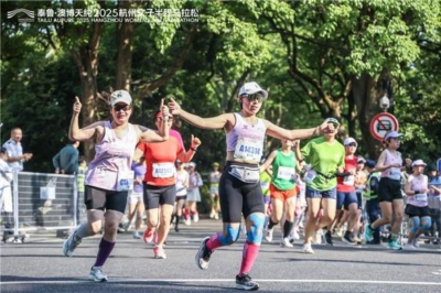 杭城初夏踏花路 2025杭州女子半程马拉松芬芳开赛